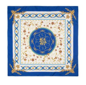 A vibrant blue and gold silk scarf marking the Coronation of King Charles III