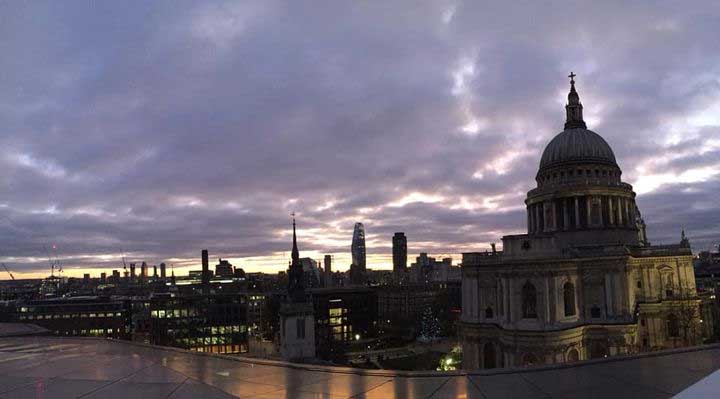 A panoramic shot of St Pauls and the London skyline at dusk.