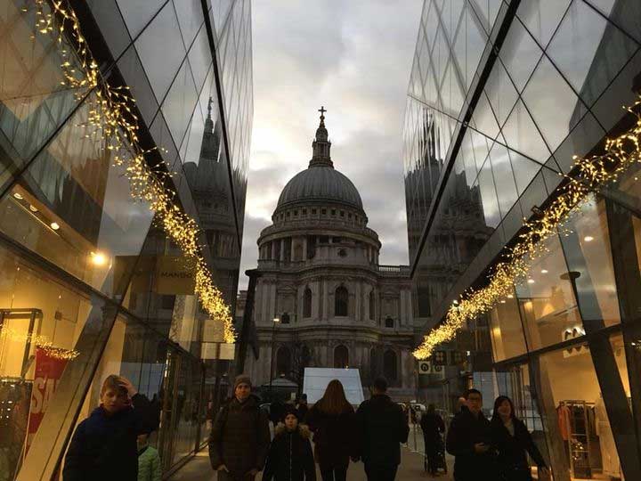 Dusk and Christmas lights from the adjacent shopping centre give this photograph of St Paul's Cathedral a Christmassy feel.