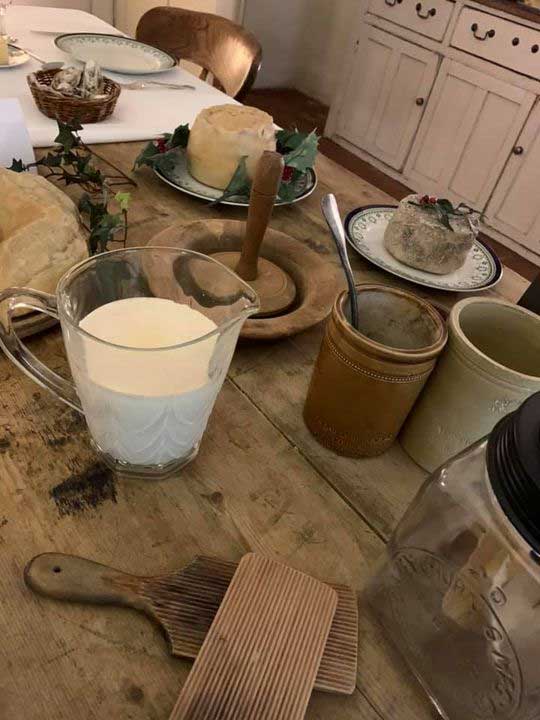 The kitchen table with Victorian cooking utensils 