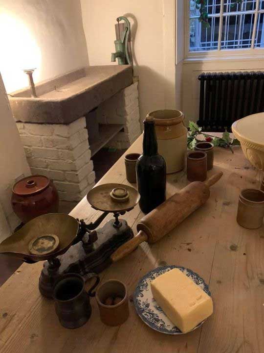 It looks as if the kitchen maids are getting ready to make pastry. Pies were a big thing in Victorian England.