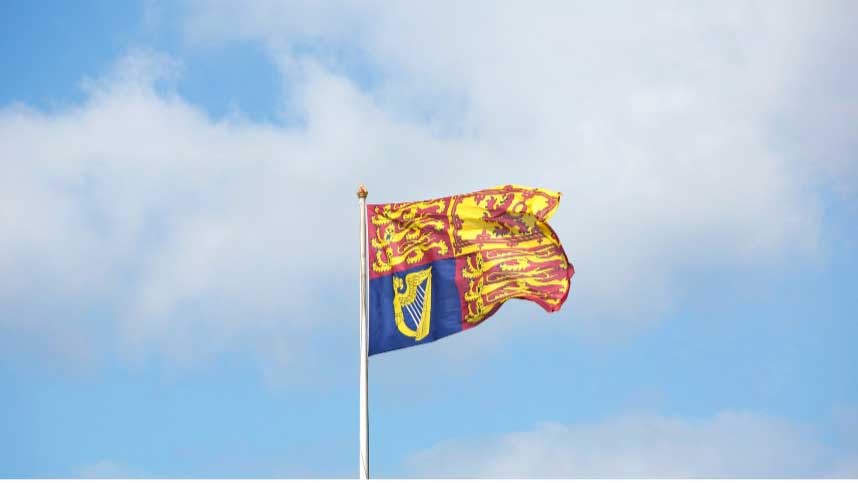 The Royal Standard flag flying over Buckingham Palace London means that the monarch is in residence.