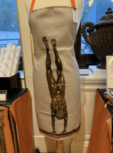 For those looking for a tasteful apron depicting a naked man. 