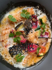 Squid in broth a jewelled work of art.